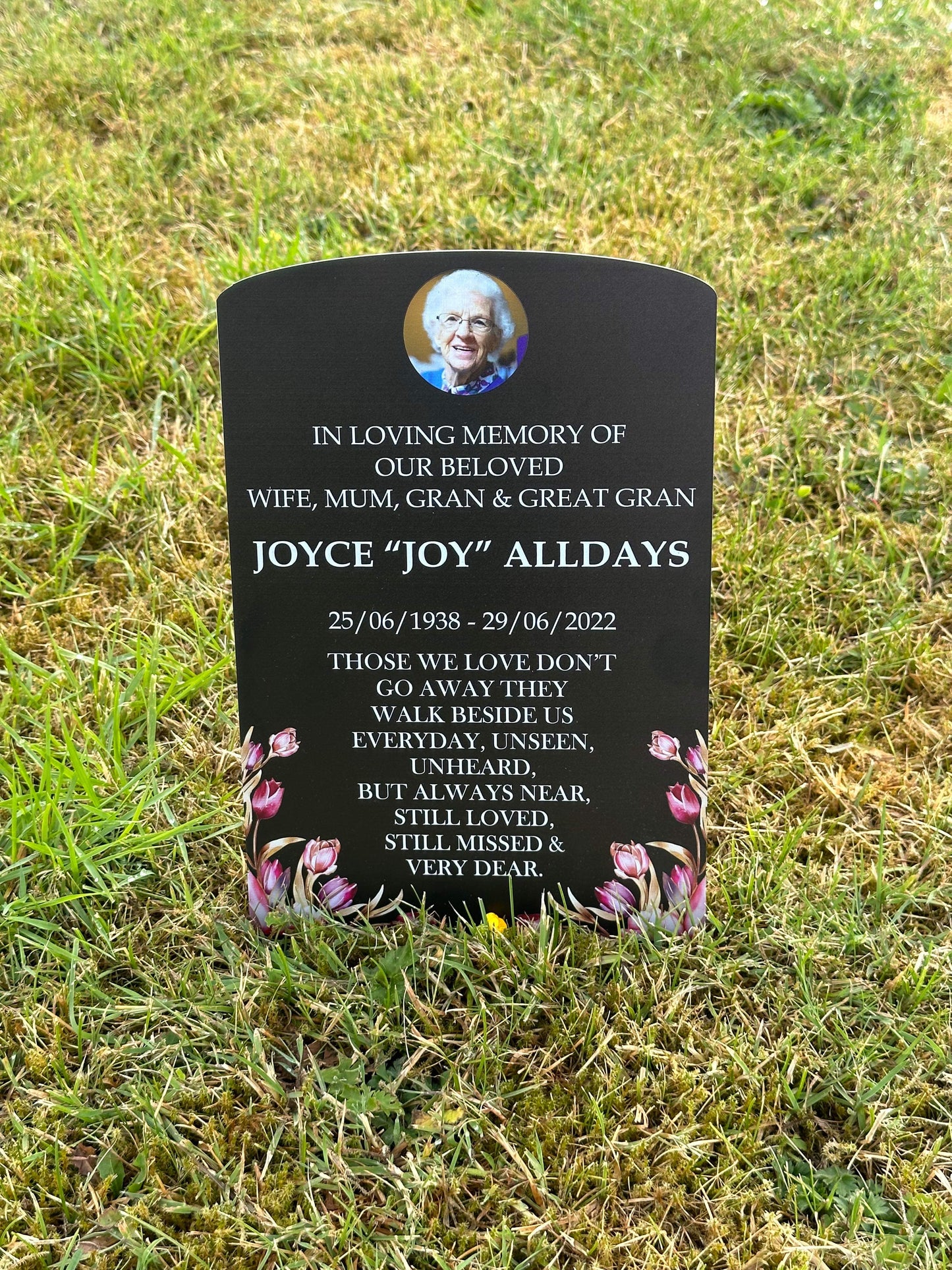 Floral temporary headstone with photo