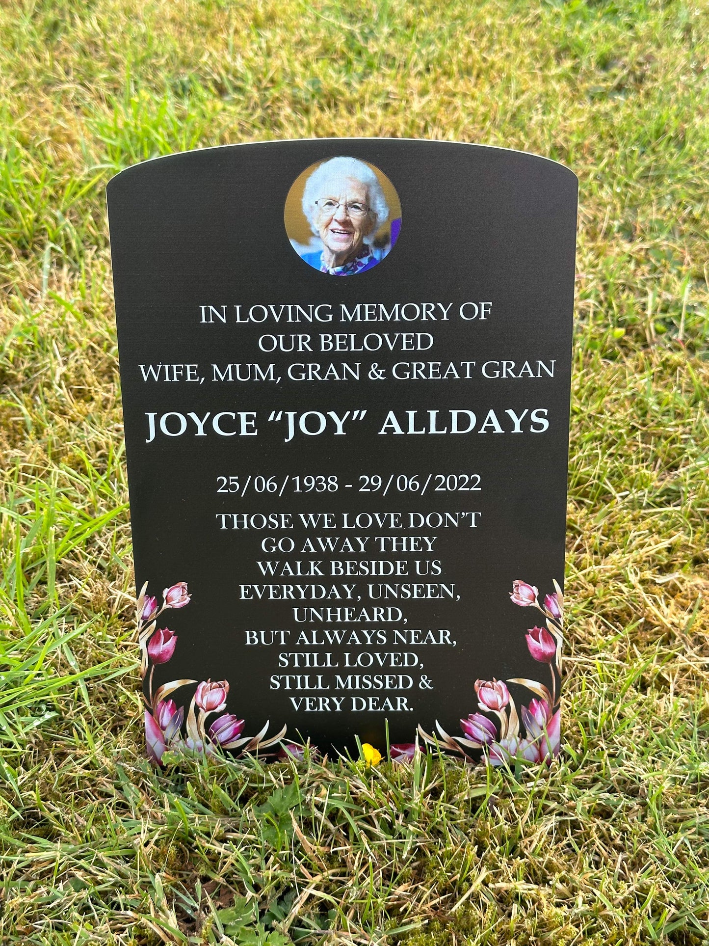 Floral temporary headstone with photo