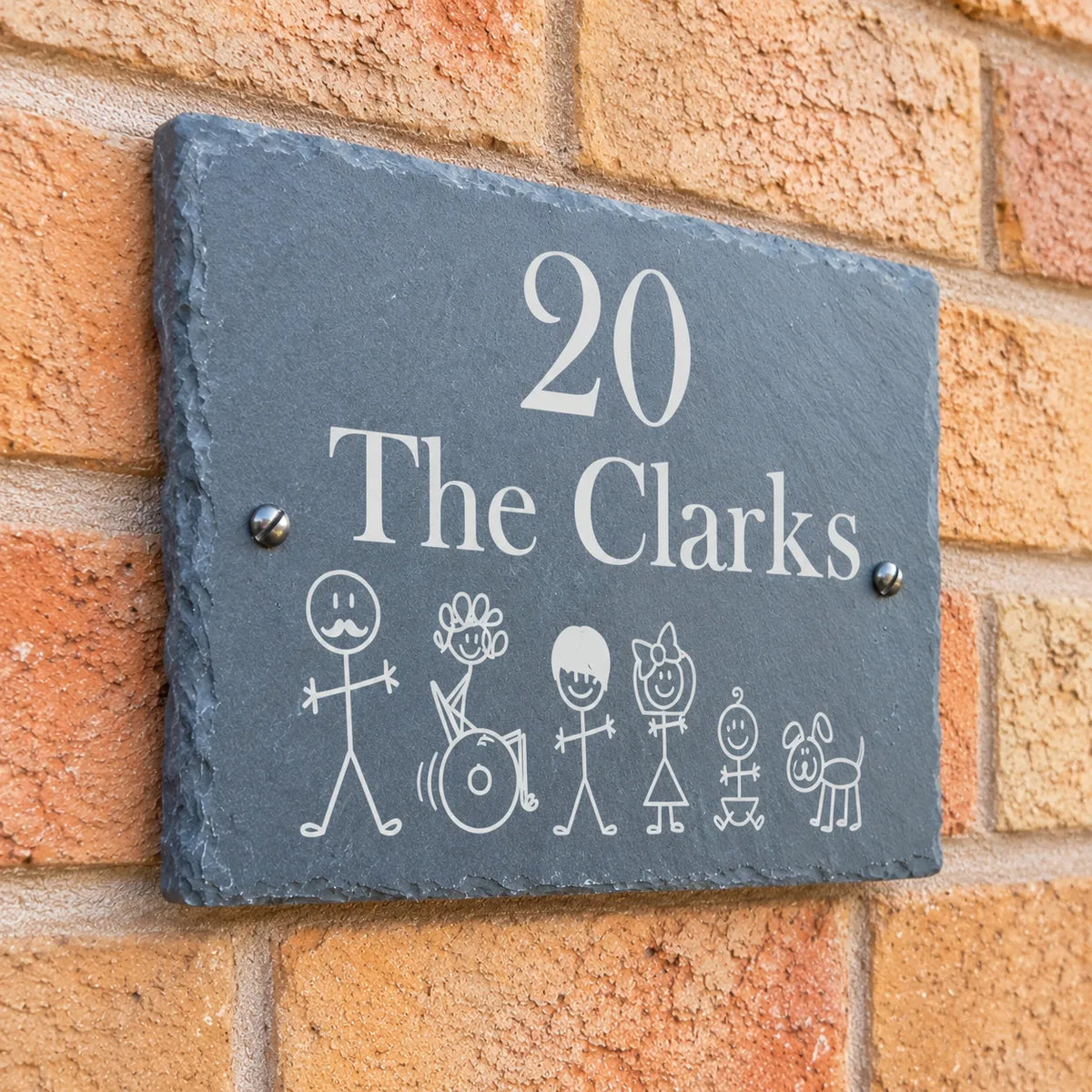 Stick figures slate house sign