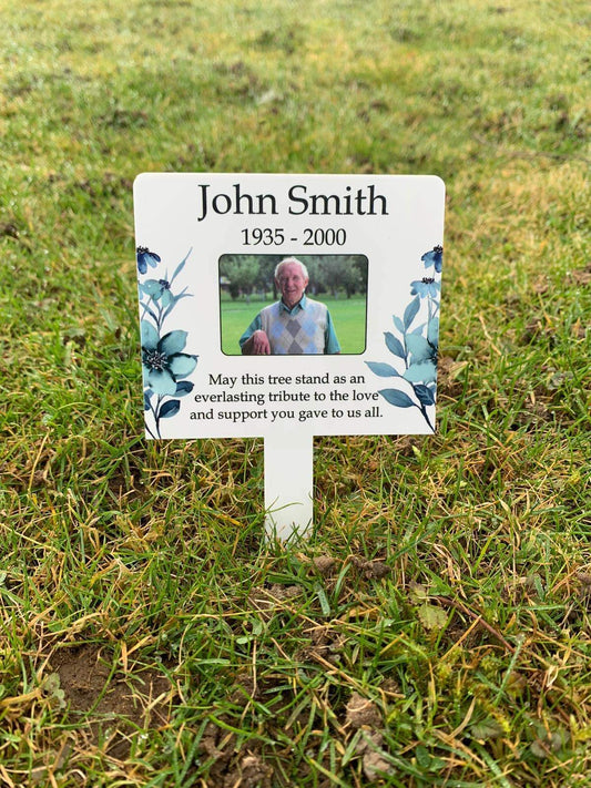 White floral memorial stake
