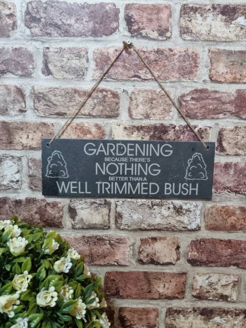 Well trimmed bush garden slate sign