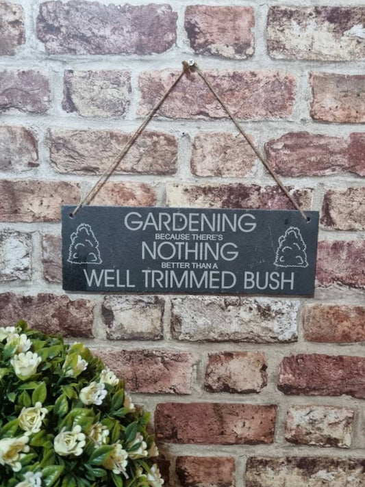 Well trimmed bush garden slate sign